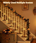 Interior view with Dazzle Bright Ramadan Curtain String Lights With 138 LEDs Warm White Star Moon Fairy Lights on staircase.