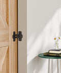 2 Pack 90 Degree Flip Barn Door Lock Set For Privacy And Real Deal Security, installed on wooden barn door, black finish