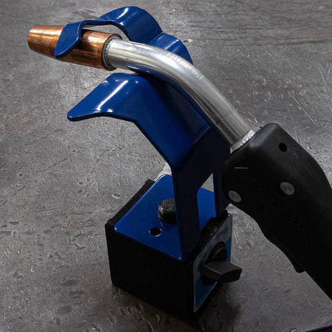 Arc-Zone MIG welding torch holder with magnetic base, blue metal stand, side view showing black torch handle.