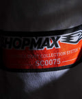 Close-up of Shopmax mobile dust collection system label on fabric, featuring model SC0075.