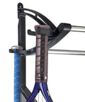 Garage Sports Gear Organizer Wall Mount Ball Rack And Storage System with rackets on heavy duty steel structure, close-up view.