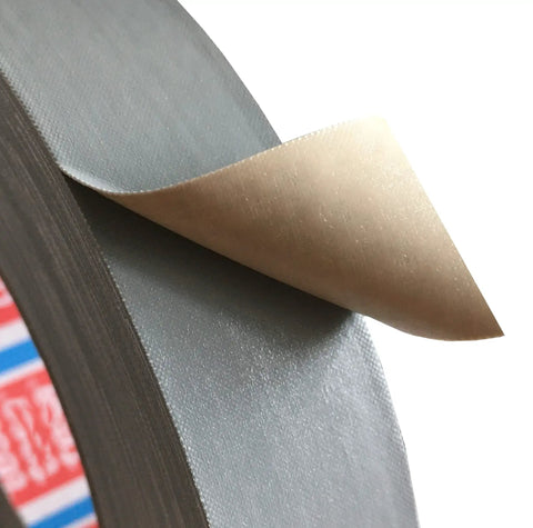Cross Hatch Adhesion Test Tape Go-To 1 Inch Wide 160 Feet Gray ASTM D3359 Compliant close-up, gray surface with peeled edge