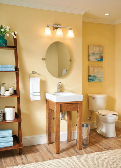 Modern bathroom featuring Spot Resistant Brushed Nickel One Handle Bathroom Faucet With Drain Assembly Flexible Install For Single Hole Or Centerset Setup Includes Optional 3 Hole Deck Plate WaterSense Certified For Eco Friendly Bath Remodel on a wooden vanity.