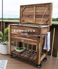 Acacia Wood Patio Cooler Made For Backyard Parties And Yard Barbecues, 100 Qt Capacity Ice Chest With Easy Open Lid shown on deck