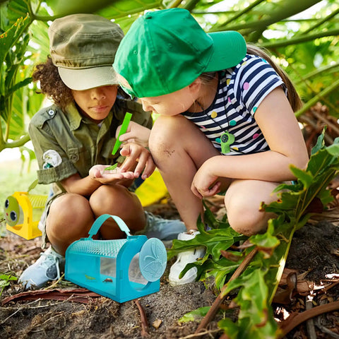 Two Piece Bug Catcher Kit For Kids with children observing bugs outdoors using magnifying glass and cages in nature setting.