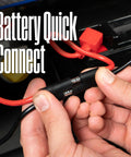 Hands connecting battery cable on Dual Fuel Portable Generator With Remote Start Transfer Switch Ready Gas Or Propane Powered Backup.