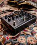 TONEX Pedal Ultra Realistic Stereo Multi-Effects For Guitar And Bass With 150 Gig-Ready AI-Powered Presets on a patterned rug