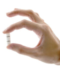 Person holding capsule of Amino Acid Chelate Calcium Capsules For Bone Density Support And Strong Bones With Organic Mineral Chelates ChelaMax