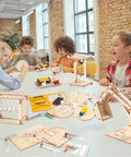 Kids assembling Awesome Science Kits For Kids Aged 8-12 With Wood Building Crafts And 5 Real Experiments Including Newton's Cradle
