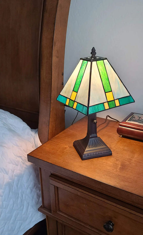 Tiffany Style Table Lamp With Stained Glass Mission Glass Panels In Rich Colors For Classic Living Room Or Bedroom Decor 8 Inch Shade 14 Inch Total Height Sturdy Metal Base Warm Ambient Glow Model AM354TL08 on a wooden nightstand