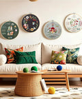 Living room decor with Beginner Friendly Embroidery Kit patterns on wall above couch, showcasing 4 pre printed 12x12 cloths, 7.8 inch hoop.