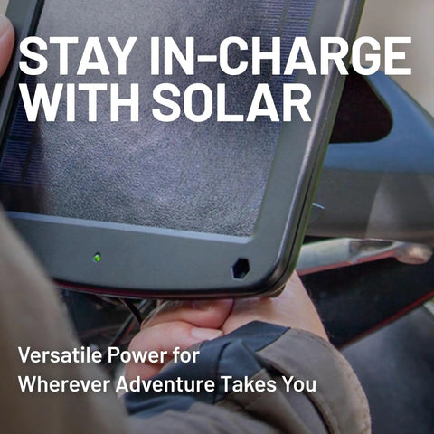 Person installing 5 Watt 12V Solar Panel Battery Charger With Charge Controller IP67 Weatherproof Windshield Or Handlebar Mount.