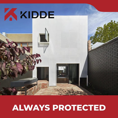 Modern white building with clean lines and brick patio, trees nearby, by AccessPoint KeySafe Pro Heavy Duty Push Button Lockbox With Cover Black