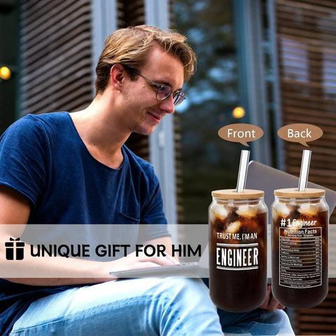 Man with laptop holding Engineer Mug For Him A Funny Gag Gift Durable Glass Cup For Engineers Valentines Day Gift For Men