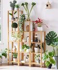 Five Tier Tall Narrow Bookshelf Takes Up Zero Floor Space While Holding All Your Favorites In A Smooth Natural Finish, displaying plants.