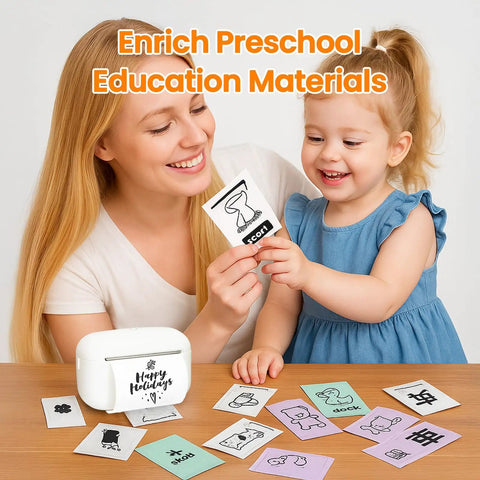 Mother and child engaging with educational flashcards next to a white label maker for preschool learning activities.