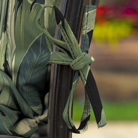Close-up of All Weather Outdoor Midback Chair Cushion In Onyx Cebu showing tied straps and water-repellent fabric design.