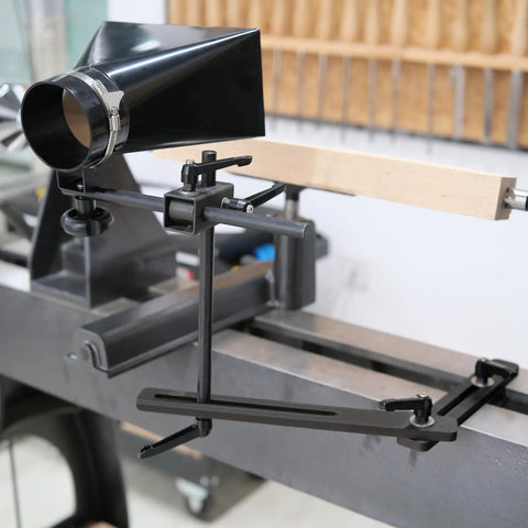 Heavy Duty Universal Woodturning Dust Hood Featuring Fully Adjustable Bracket And 100 Millimeter Hose Connector for lathe setup with wooden blank.