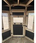 Interior view of Kick Ass Solid 6X8 Wooden Deer Blind Featuring Hella Warm R6 Insulation Panels with window openings.