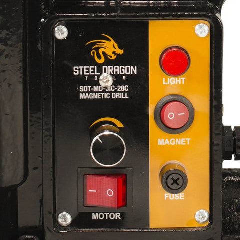Control panel of Heavy Duty Magnetic Drill Press equipped with switches for motor, magnet, light, and fuse, designed for practical use.
