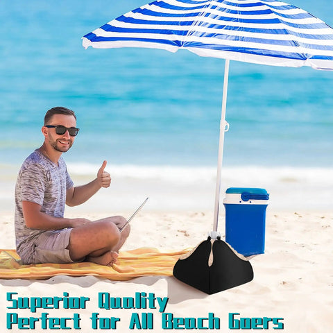 Man sitting on beach with blue stripe umbrella using Heavy Duty Beach Umbrella Base Weight Set With Fillable Sand Bags 4 Sided Anchor.
