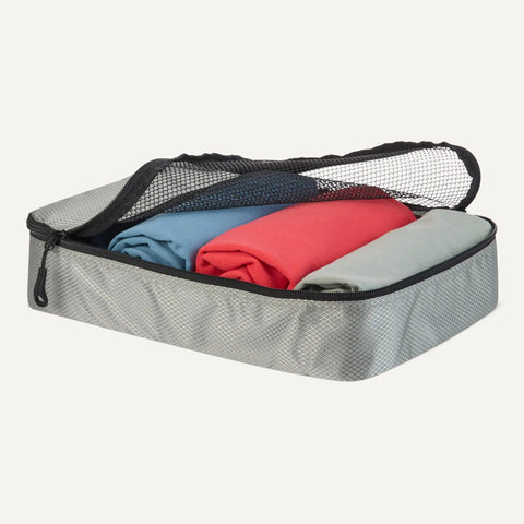 4 Piece Packing Cubes Travel Set that slashes luggage clutter with space saving design, double zippers, mesh top panel, medium size, gray