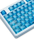 Built Damn Tough Full Aluminum Wireless Mechanical Keyboard With Hot Swappable Switches And Smart Tri Mode Pairing Featuring Custom Rgb Lighting 8000Mah Cell For Elite Gaming And Typing Setups close-up of blue backlit keys.