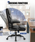 Ergonomic Leather Office Chair With Flip Up Armrests Big And Tall High Back Executive Computer And Gaming Chair With Footrest All Day Comfort Padded Support Rocking Base Boss Level Black in rocking position near desk