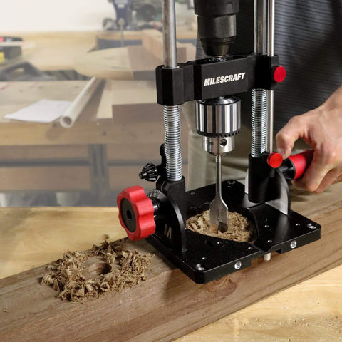 Beefy Pro Grade Portable Drill Press Drilling Guide with One Half Inch Chuck precision jig in use on wooden board