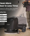 Battery Powered Walk Behind Floor Scrubber Buffer Polisher With Foldable Handle 15 Inch Brush 19 Inch Squeegee Width 4.5 Gallon Tank Includes Hard Brush And 3 Scouring Pads For Heavy Duty Commercial Cleaning; operator using scrubber in industrial setting.