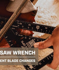 7/16" saw wrench shown with hands for blade changes, highlighting solid construction and ease of use.