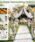 Heavy Duty 86 Inch Steel Garden Arch Pergola Arbor With Ground Stakes For Climbing Plants Ideal For Weddings Parties And Backyard Decor Weatherproof Powder Coated Frame For All Seasons decorated with flowers and balloons at an outdoor event.