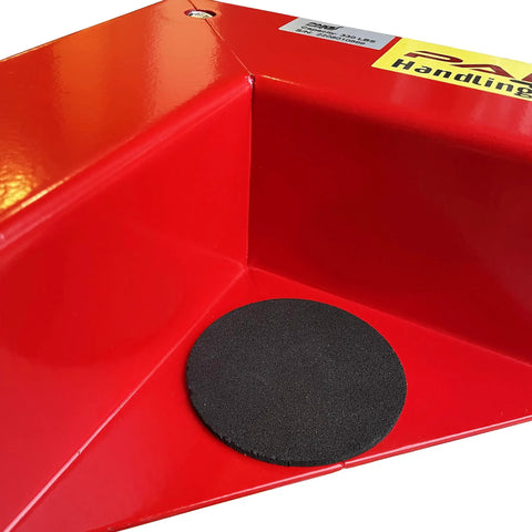 Close-up of a red heavy duty low profile furniture dolly, with a black rubber base, part of the set of 4 with quiet PU rollers.