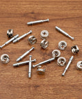 25 Piece Furniture Cam Lock Bolts And Screws With Eccentric Cams Self Tapping Pins, silver metal fasteners on wood surface.