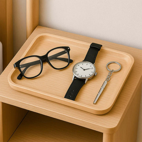 Compact 4 Piece Mini Eyeglass Screwdriver Set With 3 In 1 Flathead And Phillips Drivers on a wooden tray with glasses and watch.