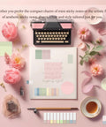 Decorative desk arrangement with typewriter, flowers, stationery items, and pastel sticky notes for creative note-taking.