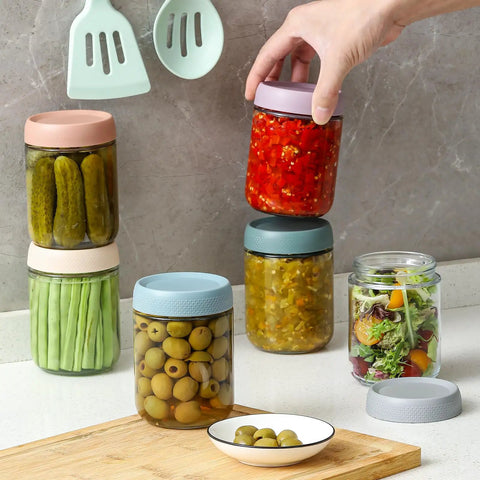 Six Pack 16 Oz Glass Jars With Airtight Lids For Overnight Oats, Snacks And Meal Prep, Mason Style Jars on kitchen counter