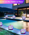 2 Pack Solar Garden Lights With 80 LED Colorful Cracked Glass Balls by a pool, multicolor outdoor decorative lights for yard and patio