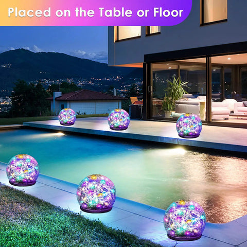 2 Pack Solar Garden Lights With 80 LED Colorful Cracked Glass Balls by a pool, multicolor outdoor decorative lights for yard and patio