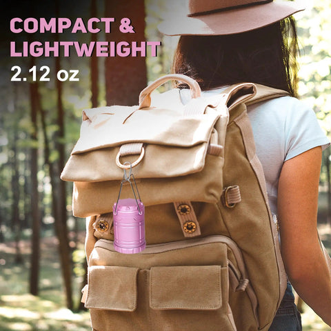 2 Pack Mini LED Pink Camping Lanterns Portable Outdoor Handheld Lights on backpack in forest