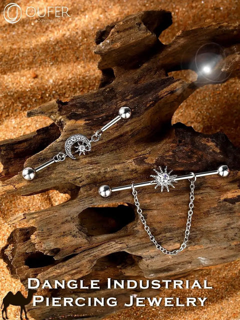 Dope Industrial Piercing Jewelry 316L Surgical Steel Barbell With Clear CZ Moon Dangle, 38mm Long, 14G on wood background