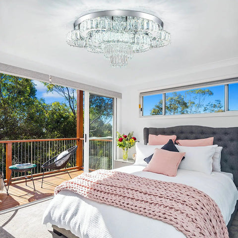 21 Inch Crystal LED Flush Mount Chandelier With K9 Crystals And Polished Stainless Steel Showstopper Glow in a bright bedroom.