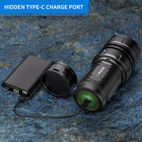 Diving Flashlight DL06 Max 15000 Lumen Scuba Light with USB-C charging cable connected on rocky surface