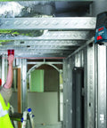 All In One Pro Grade Self Leveling Cross Line Laser With Plumb Points For Quick Leveling 65 Ft Range mounted on ceiling