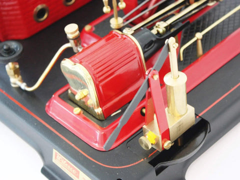 Close-up of D21 Steam Engine Model With Esbit Dry Fuel Burner TÜV Certified showing detailed components and metallic finish