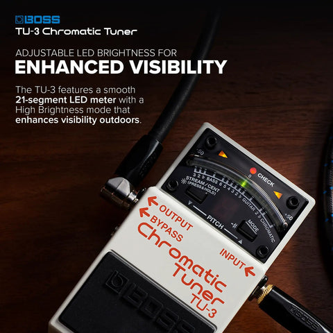 Compact Chromatic Tuner Pedal for Guitar and Bass with 21-Segment LED Meter, High Brightness Mode for Sunny Stages on wooden surface