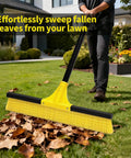 Person using Heavy Duty Push Broom With 60 Inch Long Handle And 18 Inch Stiff Bristle Head For Floor Cleaning Indoors Outdoors on lawn