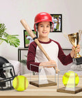 Child holding trophy behind Clear Acrylic Softball Display Case With Wood Base For One Ball, Dustproof Memorabilia Stand Cube Holder.