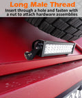 Two neodymium magnets with 1/4''-20 threaded studs and rubber covers mounting a rectangular LED light bar on a red tailgate.