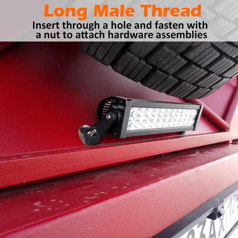 Two neodymium magnets with 1/4''-20 threaded studs and rubber covers mounting a rectangular LED light bar on a red tailgate.